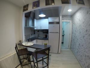 Kuchyň nebo kuchyňský kout v ubytování Apartamento Toledo San Justo