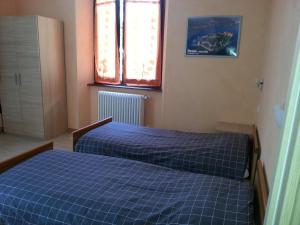 Кровать или кровати в номере Casa Giardinetto