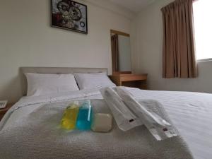Postel nebo postele na pokoji v ubytování De Ocean Hotel