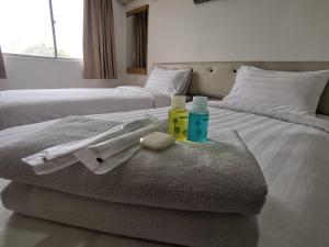 Postel nebo postele na pokoji v ubytování De Ocean Hotel