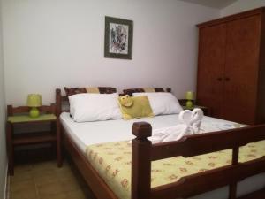 Postel nebo postele na pokoji v ubytování Miron apart&rooms