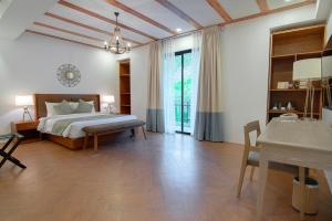 Voodi või voodid majutusasutuse Thunderbird Resorts - Rizal toas