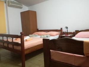 Postel nebo postele na pokoji v ubytování Miron apart&rooms