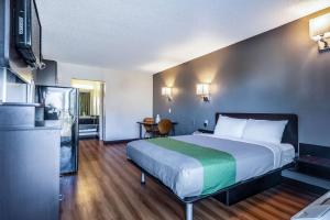 a hotel room with a bed and a kitchen at Studio 6-Little Rock, AR - West in Little Rock +21 photos