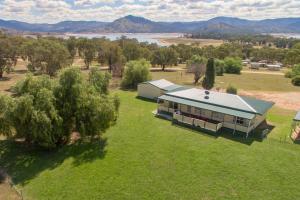 an overhead view of a house on a grass field at Reflections Grabine Lakeside - Holiday Park in Bigga