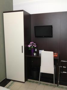 A television and/or entertainment centre at Terrazze Villanova