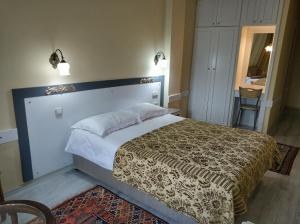 a bedroom with a large bed in a room at Hali Hotel in Istanbul