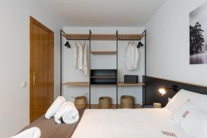 Postel nebo postele na pokoji v ubytování Petit Luxe Ègara
