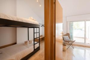 Postel nebo postele na pokoji v ubytování Petit Luxe Ègara
