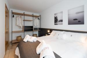 Postel nebo postele na pokoji v ubytování Petit Luxe Ègara