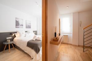Postel nebo postele na pokoji v ubytování Petit Luxe Ègara