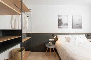 Postel nebo postele na pokoji v ubytování Petit Luxe Ègara