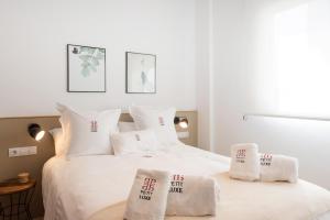 Postel nebo postele na pokoji v ubytování Petit Luxe Ègara