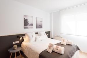 Postel nebo postele na pokoji v ubytování Petit Luxe Ègara
