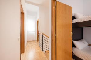 Postel nebo postele na pokoji v ubytování Petit Luxe Ègara