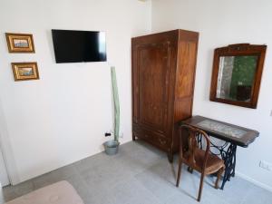 TV a/nebo společenská místnost v ubytování El Sesterzio