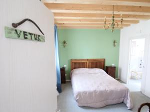 Postel nebo postele na pokoji v ubytování El Sesterzio