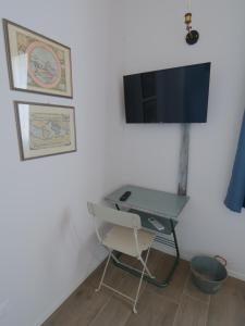 TV a/nebo společenská místnost v ubytování El Sesterzio