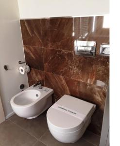 Kúpeľňa v ubytovaní Hotel Lancaster