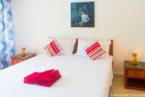 Postel nebo postele na pokoji v ubytování Alona Vida Beach Hill Resort + 13 fotografií