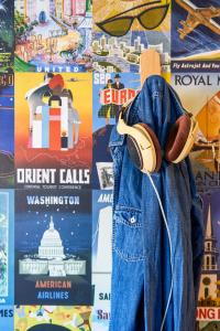 a pair of headphones hanging from the back of a pair of jeans at hotelF1 Toulouse Aéroport in Blagnac