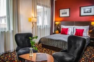 Posteľ alebo postele v izbe v ubytovaní Budapest Airport Hotel Stáció Wellness & Konferencia