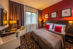 Posteľ alebo postele v izbe v ubytovaní Budapest Airport Hotel Stáció Wellness & Konferencia