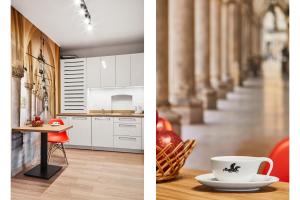 Kuchyňa alebo kuchynka v ubytovaní Krakow For You Budget Apartments