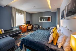 Posteľ alebo postele v izbe v ubytovaní Budapest Airport Hotel Stáció Wellness & Konferencia