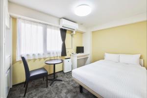 FLEXSTAY  東十條旅館房間的床 +31 張相片