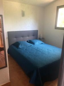 Postel nebo postele na pokoji v ubytování Résidence U LATONU - Palombaggia