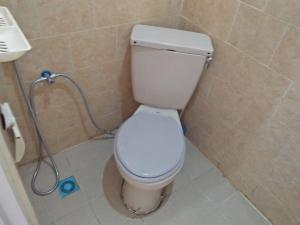 Koupelna v ubytování Made Roejas Homestay + 37 fotografií