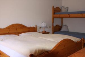 Säng eller sängar i ett rum på Berggasthof Trattes