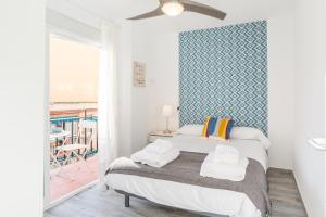 Posteľ alebo postele v izbe v ubytovaní Berlanga, apartamento en el centro