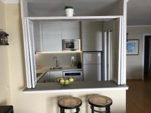 Virtuvė arba virtuvėlė apgyvendinimo įstaigoje Llevant - Vistas espectaculares
