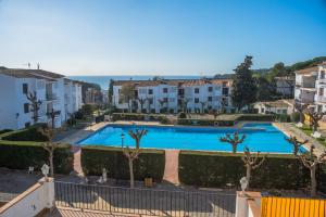 Bazén v ubytování M-1 CALELLA DE PALAFRUGELL 4 PAX nebo v jeho okolí