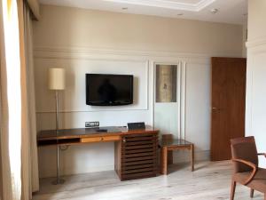 TV a/nebo společenská místnost v ubytování Hotel Olid