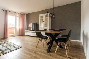 Kuchyňa alebo kuchynka v ubytovaní Apart-Invest Apartament Pastelowy