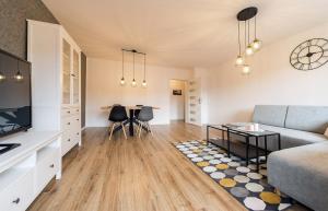 Kuchyňa alebo kuchynka v ubytovaní Apart-Invest Apartament Pastelowy