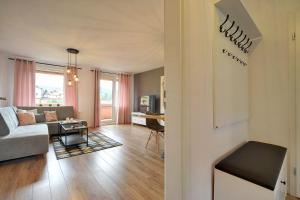 Posedenie v ubytovaní Apart-Invest Apartament Pastelowy