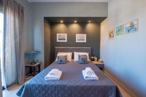 Posteľ alebo postele v izbe v ubytovaní Villa Oliva Rodos
