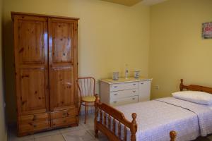 A bed or beds in a room at AMISIANA HOUSE