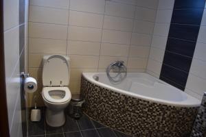 A bathroom at AMISIANA HOUSE