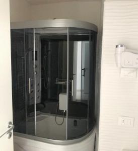 Ett badrum på Time Out ApartHotel