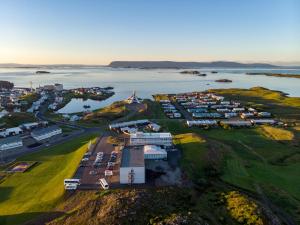 an aerial view of a town next to a body of water at Fosshotel Stykkisholmur in Stykkishólmur