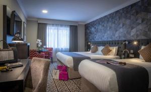 Postel nebo postele na pokoji v ubytování Talbot Hotel Stillorgan