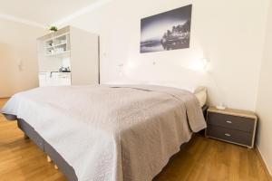 Postel nebo postele na pokoji v ubytování Apartment Kaiserstraße
