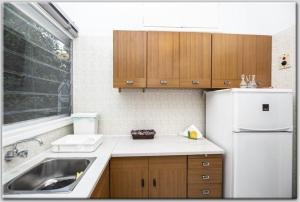 A kitchen or kitchenette at Anni's apartments 50m from the beach Még 9 kép