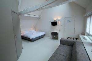Postel nebo postele na pokoji v ubytování Hotel Matelote