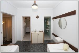 A bed or beds in a room at Anni's apartments 50m from the beach